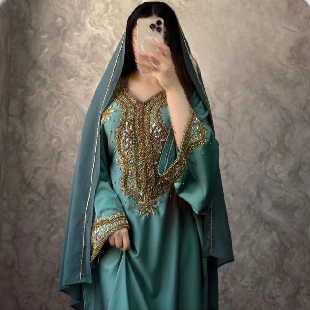 Elegant Teal Embroidered Dress. Very beautiful and long.